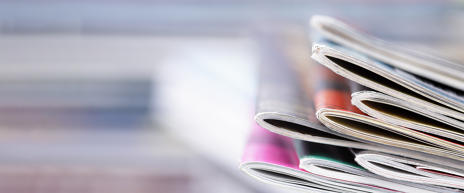 Stack of opened magazines