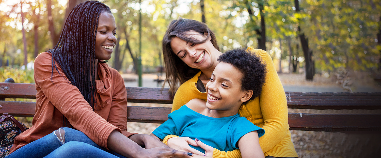 Multi ethnic friends with kid