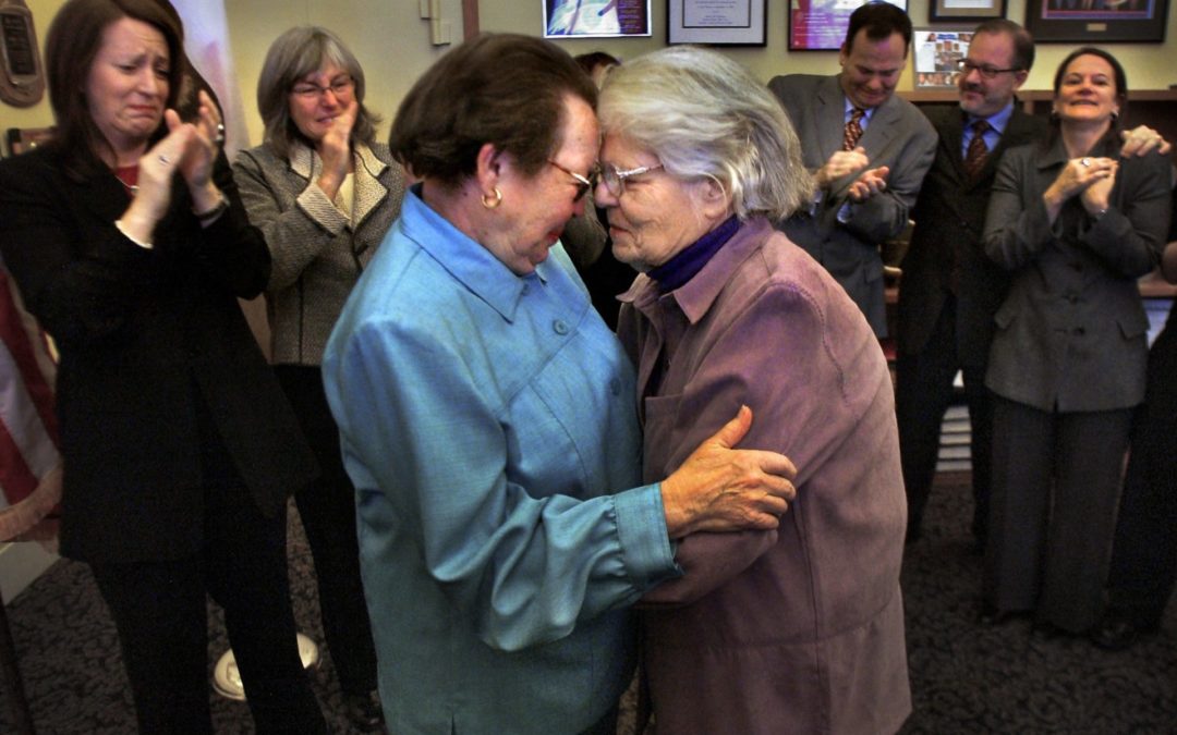 Phyllis Lyon and Del Martin embrace after their marriage at City Hall in 2004.